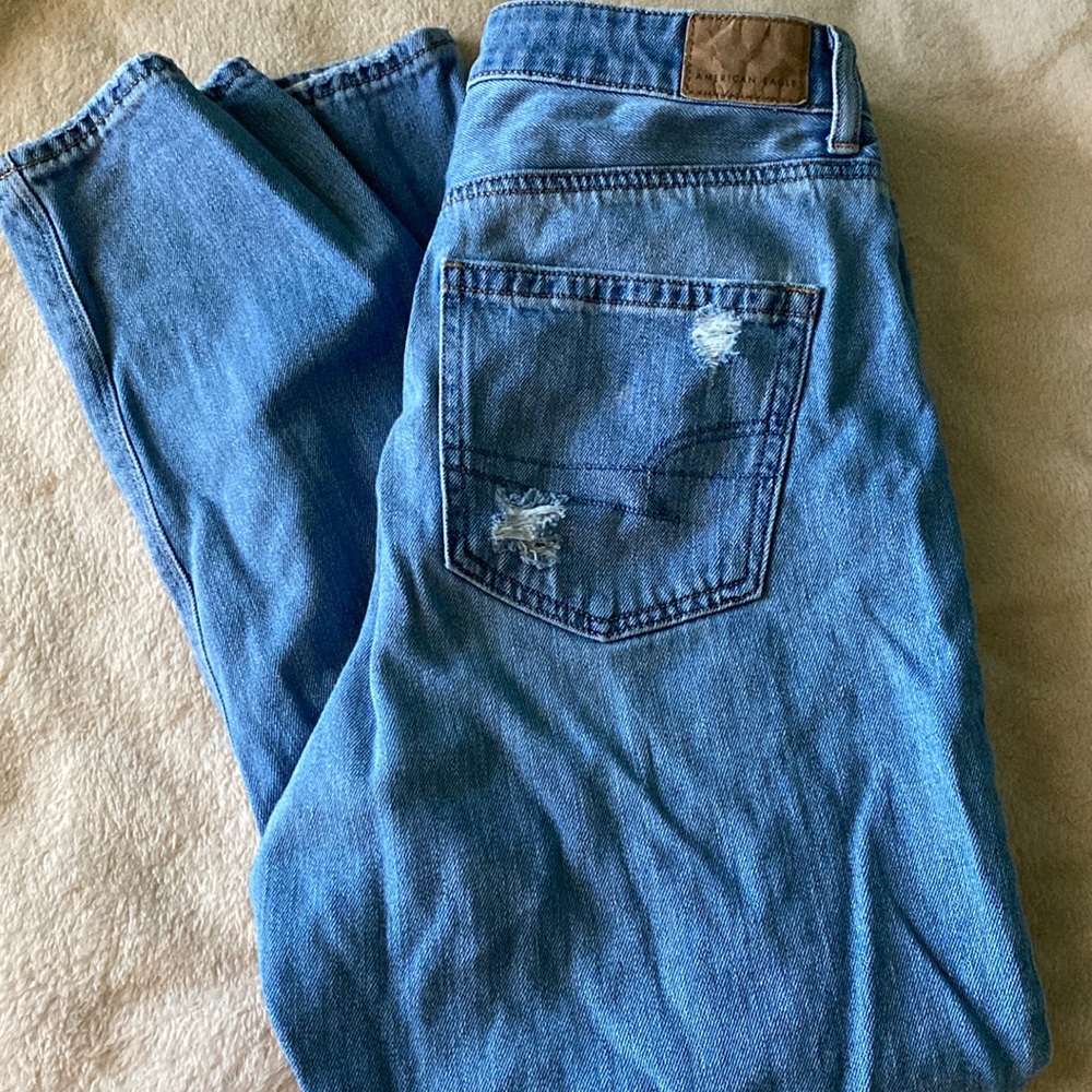 high waisted, ripped blue jeans